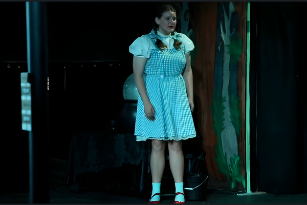 Students performing on stage at JDS Creative Academy, learning teamwork, confidence, and life skills through theater education.